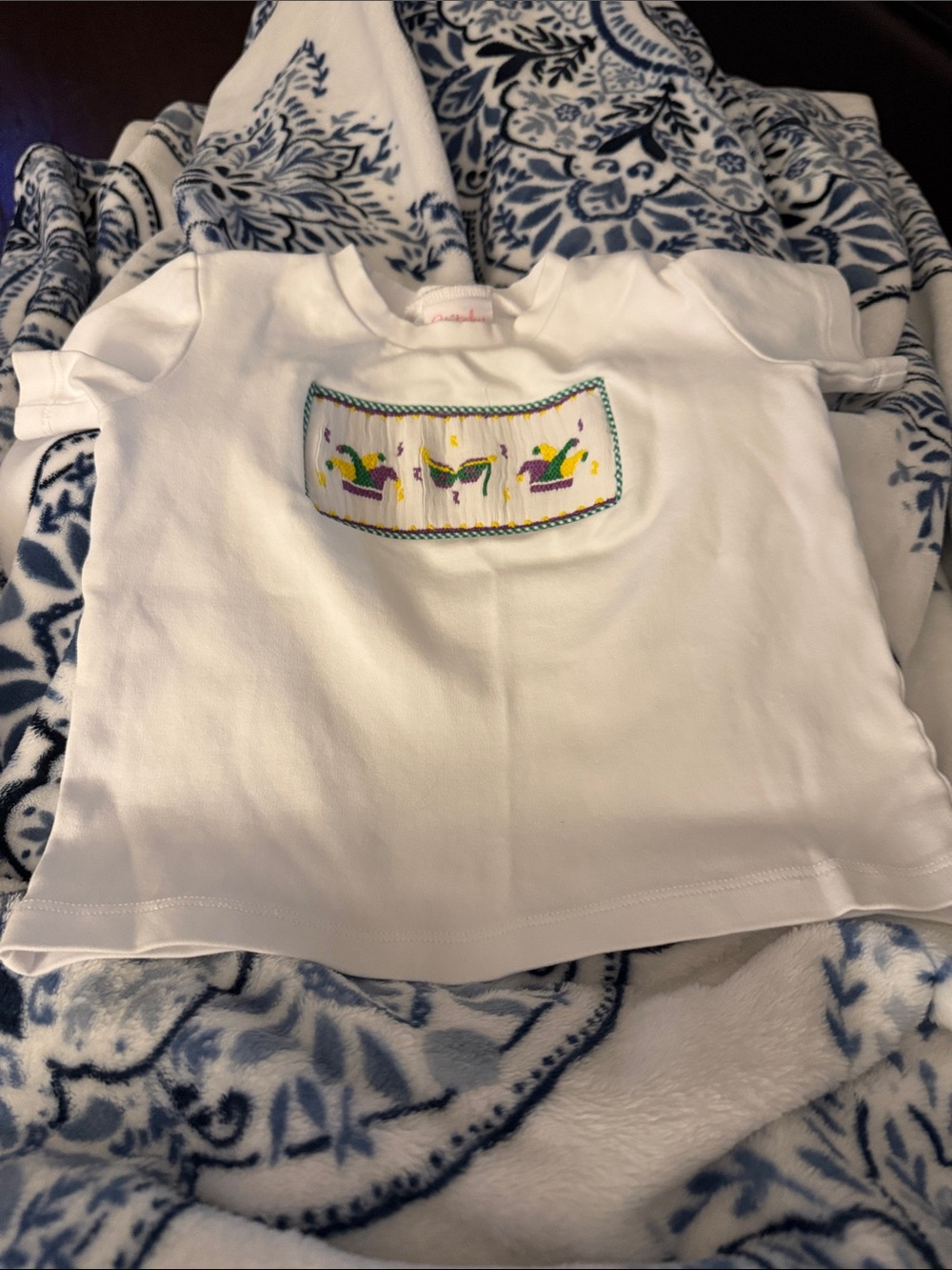 White Short-Sleeve Kids Top with Colorful Carousel Smocking